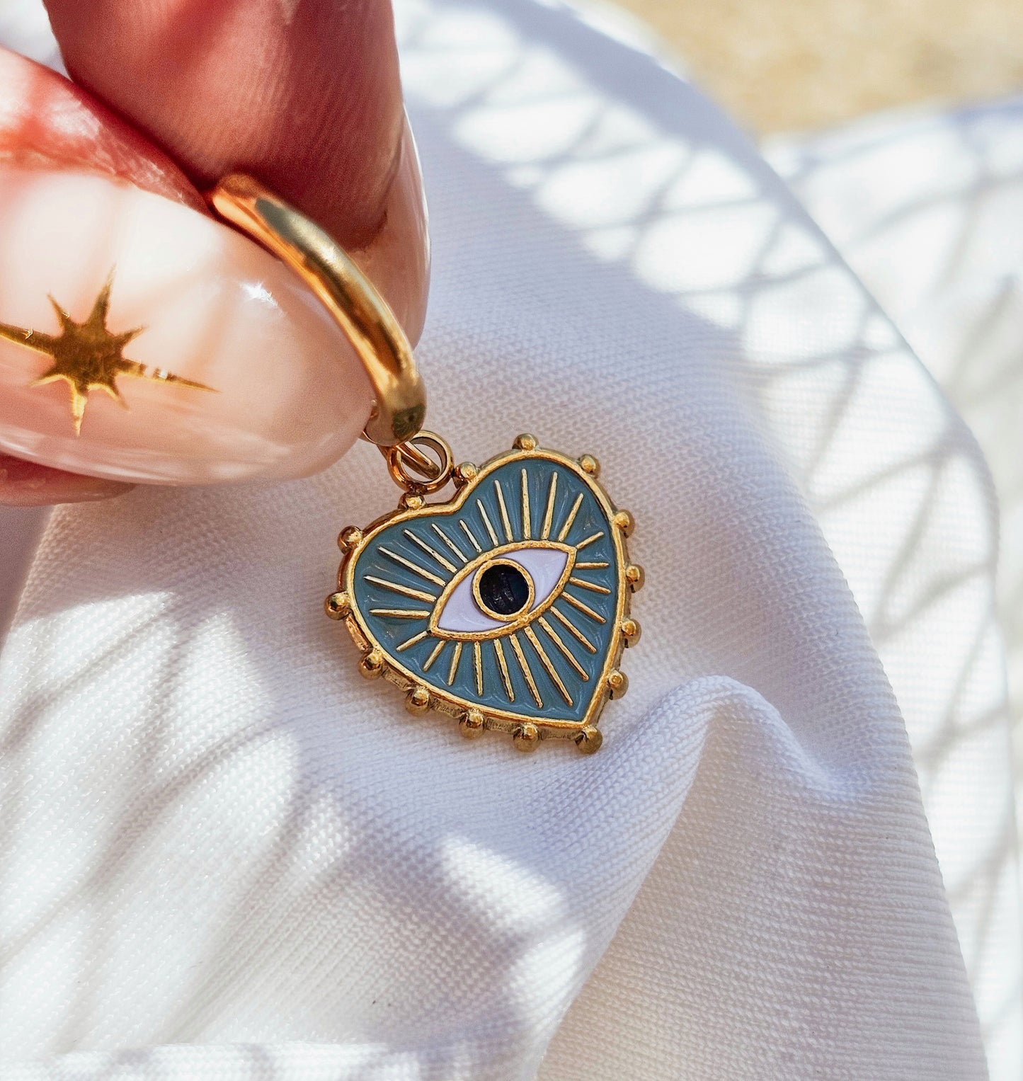 Single Heart Blue Eye Earrings