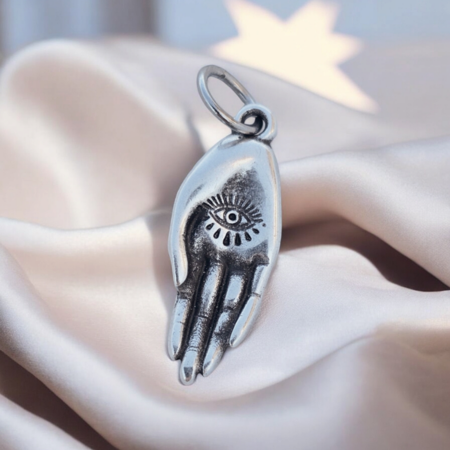 Charm Mano e Occhio