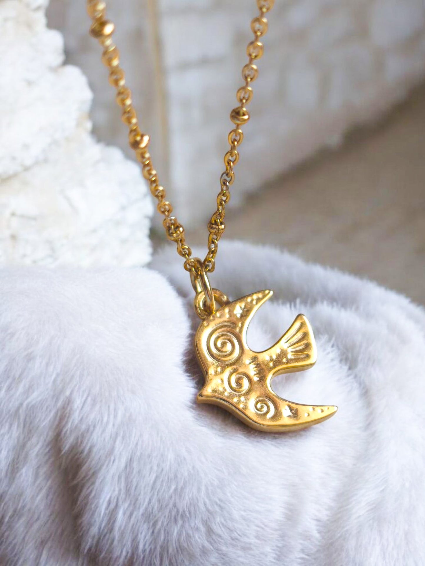 Charm Rondine Aura