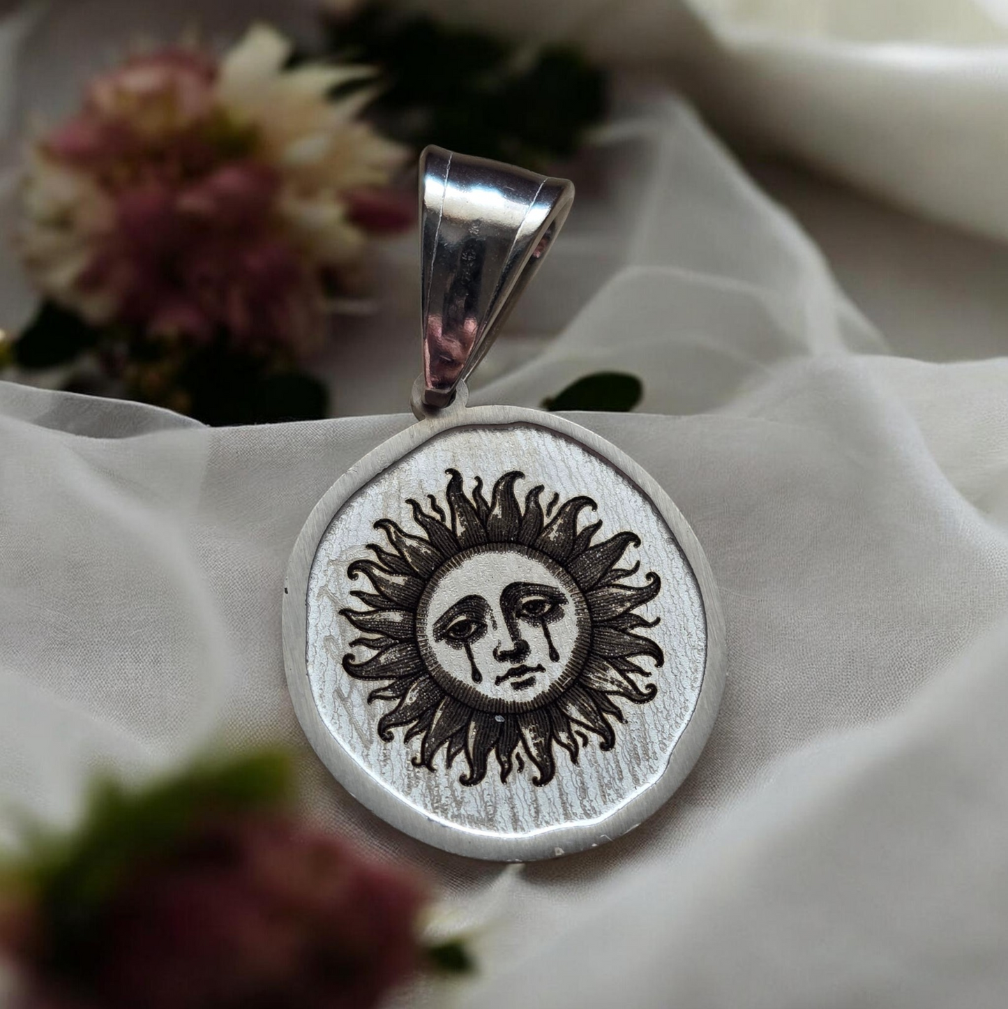 Crying Sun Charm